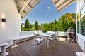 Designer-Villa mit großem Raumangebot und schönem Garten - Loungebereich mit Außenkamin