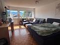 2 Zimmer Mietwohnung mit schönem Bergblick in 83410 Laufen - frei ab 01.09.2026 - Aufzug vorhanden - Wohnzimmer