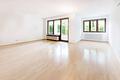 Großzügige 1-Zimmer-Erdgeschosswohnung mit Süd-Terrasse in Bogenhausen - Wohnzimmer (möbel digital entfert)