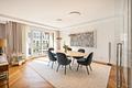 Klassische Eleganz im "Ludwig": 3-Zimmer-Luxus-Domizil mit Liftlanding, Terrasse und Stellplätzen - Zeitlose Eleganz macht den Essbereich zu einem exzellenten Rahmen für Gastlichkeit 