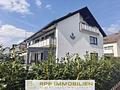 Helle 4,5-Zimmer-Wohnung mit Süd-Balkon und eigenem Garten in Lohhof - Hausansicht