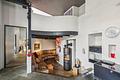 Toller Split-Level-Atrium Bungalow mit 3 Garagenstellplätzen I 10 Jahre Wohnrecht für Verkäufer - Kaminecke mit offenem Kamin