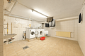 Erbpacht: Vermietete 3-Zimmer-Wohnung mit Balkon und Tiefgaragenstellplatz in Unterschleißheim - Waschraum