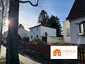 Einfamilienhaus mit zusätzlichem Baugrundstück - Straßenseitige Ansicht