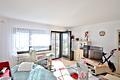 Gepflegte 2-Zimmer-Eigentumswohnung mit Balkon und Garage in ruhiger Lage von Bad Wildbad - Wohnzimmer