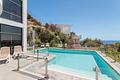 Moderne Villa mit beheiztem Pool und spektakulärem Panoramablick auf Küste und Meer und mit Vermietungslizenz