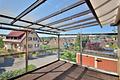 Charmantes Zweifamilienhaus mit Weitblick – renovierungsbedürftig, aber voller Möglichkeiten - Wintergarten