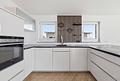 Skyline-Gefühl inklusive – Exklusives Penthouse mit Süd-West-Dachterrasse & Whirlpool - Küche