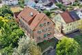 Historischer Charme, sichere Rendite: Voll vermietetes Denkmalobjekt mit 9 Wohneinheiten - Haus und Umgebung