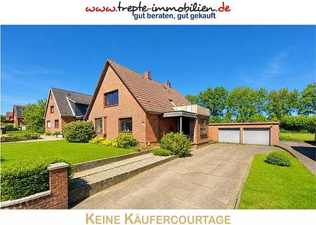 Vielseitiges Zweifamilienhaus mit großem Potenzial & teilbarem Grundstück - Hauptbild
