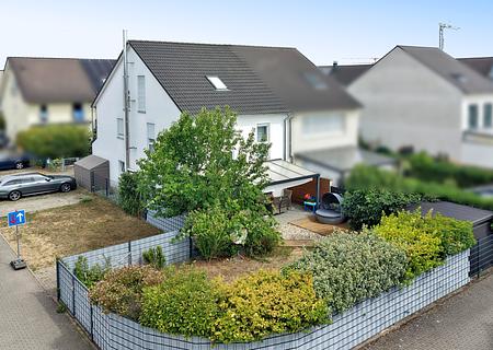 Modernes Wohnen in Oftersheim: Erstklassig gepflegte Doppelhaushälfte sucht neue Eigentümer - Ansicht