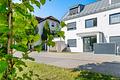 Modernes Mehrfamilienhaus in München – voll vermietet, junges Baujahr, klare Investmentqualität - Hausansicht