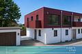 Stadtvilla mit kleinem Garten - Neubau Massivholzhaus am Waldrand mit 180m² Wohnfläche - FINESTEP Immoblien
