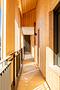 Erstbezug: Besonders großzügige 4-Zimmer-Wohnung mit umlaufendem Balkon und Loggia - Stylische Holzelemente