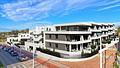 Penthouse-Wohnungen mit 2 Schlafzimmern, 2 Bädern, Dachterrasse, Möblierung, Meerblick, Tiefgaragenstellplatz und Gemeinschaftspool