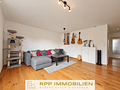 Renovierte 3-Zimmerwohnung mit sonniger West-Loggia in Oberschleißheim - Wohnzimmer