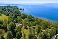 Rarität mit Alpen-Panorama und Seezugang: Ikonische Architekten-Villa mit hoher Privatsphäre - 30.206 m² großes Parkgrundstück